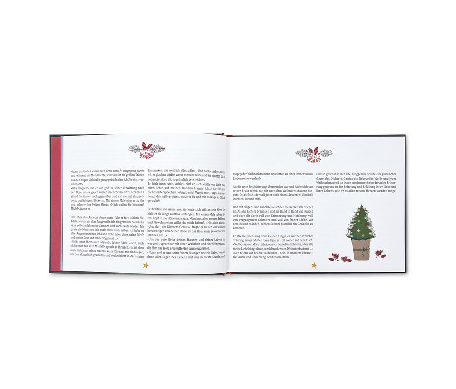 Aufgeschlagenes Buch mit einer Illustration eines Weihnachtsbaums und Text.