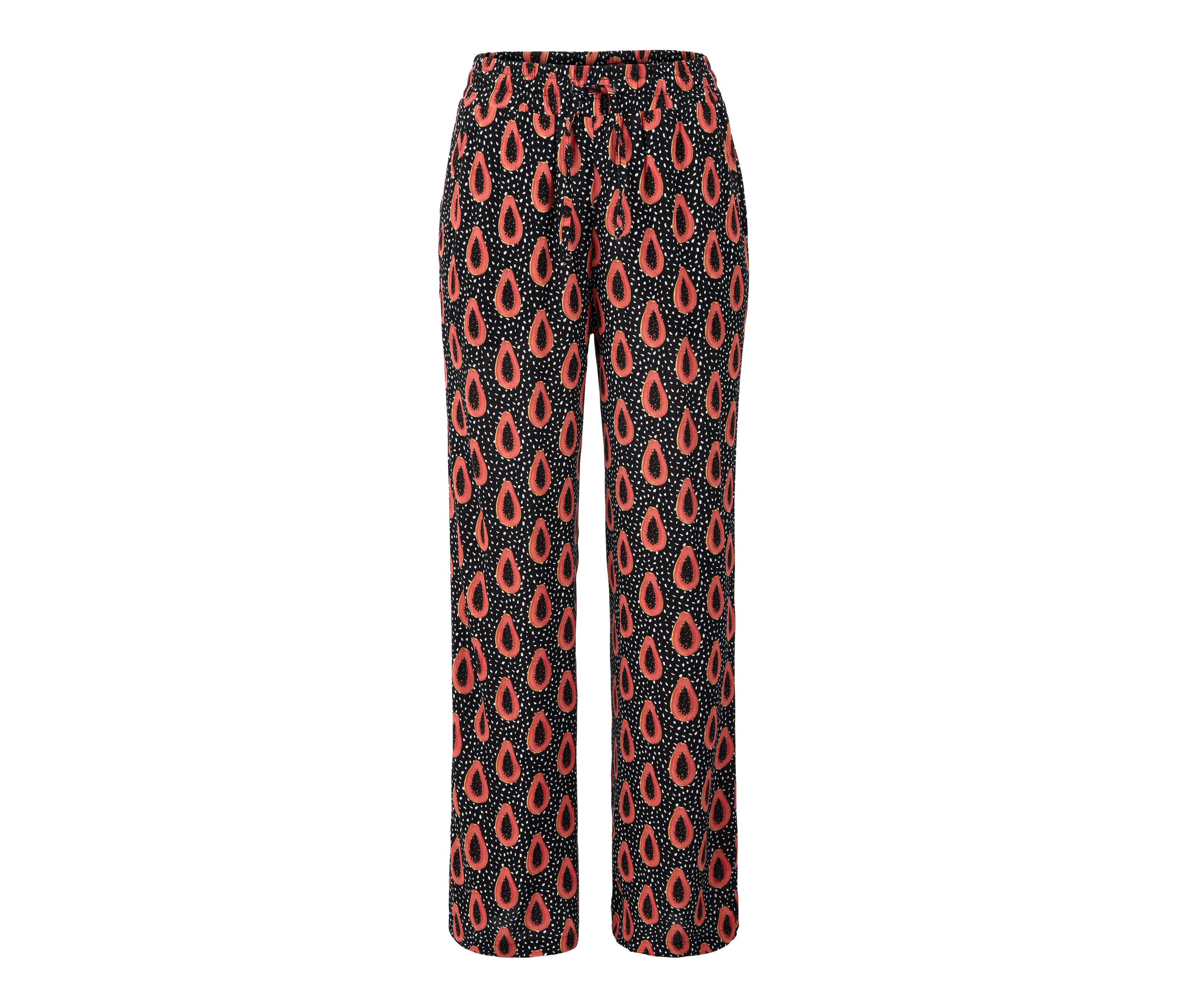 Schwarze Schlupfhose mit orangefarbenen und weißen Mustern.