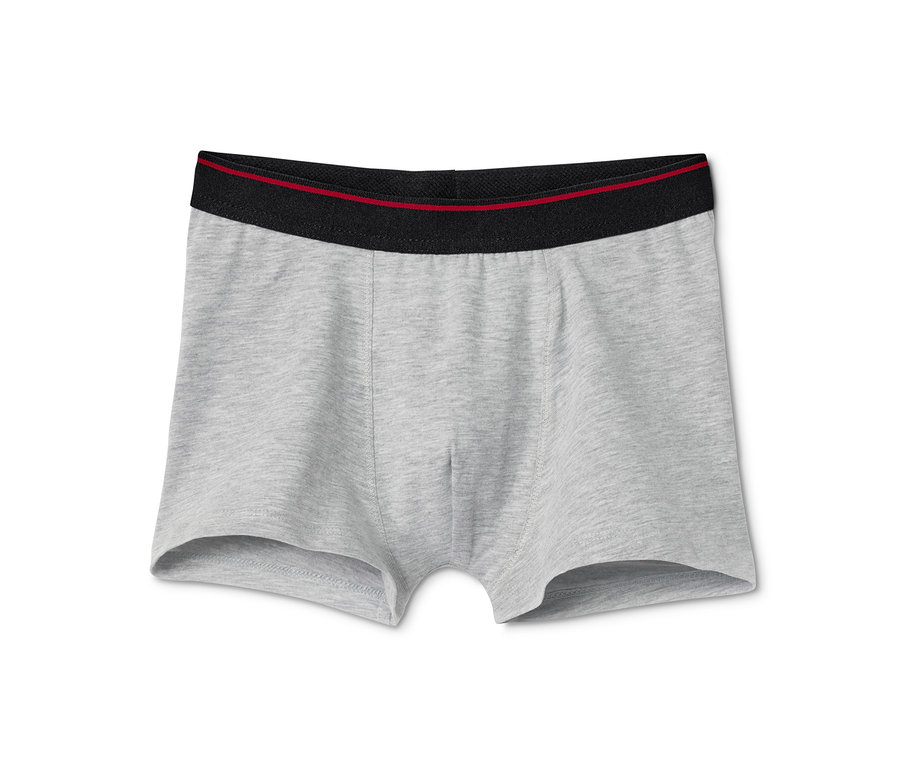 Detailansicht: 7 Jungen-Slipboxer, schwarz-weiß.