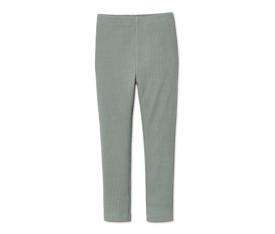 Eine grüne gerippte Leggings aus Bio-Baumwolle.