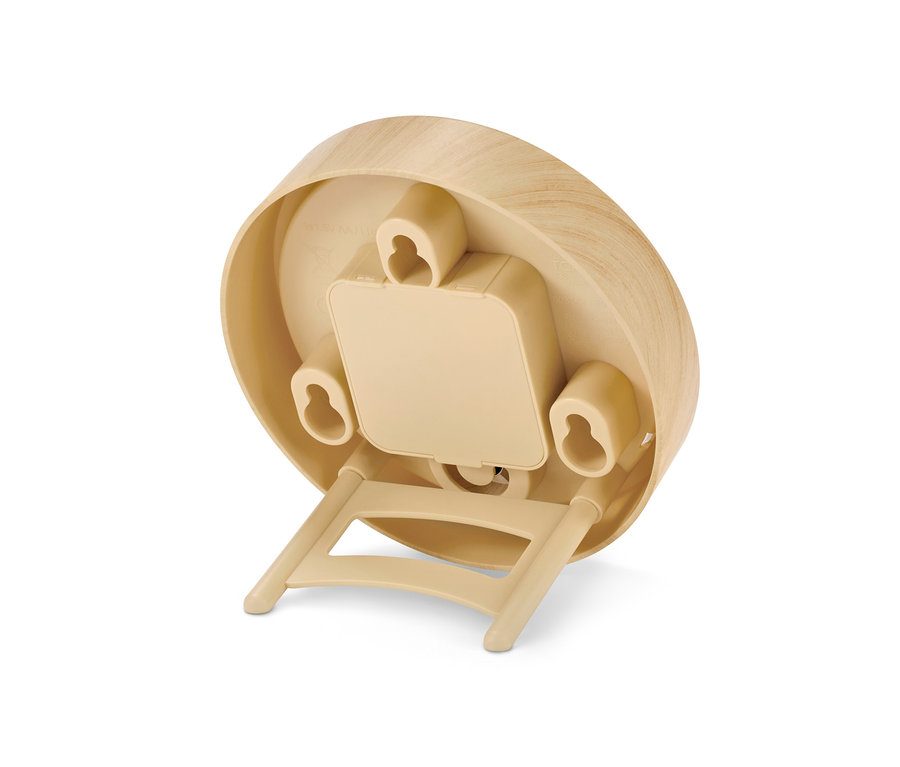 Detailansicht der Rückseite einer Badwanduhr mit Thermometer.