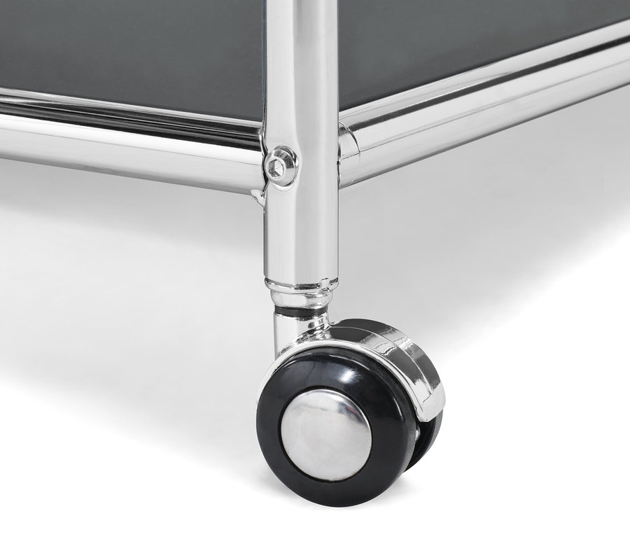 Detailansicht eines Rades des grauen Couchtisches »CN3« mit Rollen.