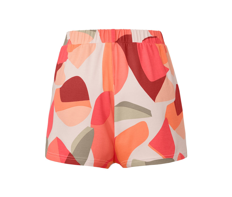 Eine Shorts mit einem orange-roten Muster auf weißem Hintergrund.
