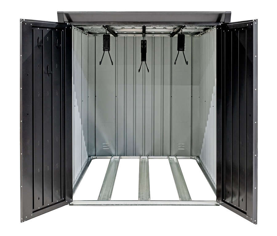 Geöffnete Fahrradbox mit Fahrradhalterungen im Inneren.