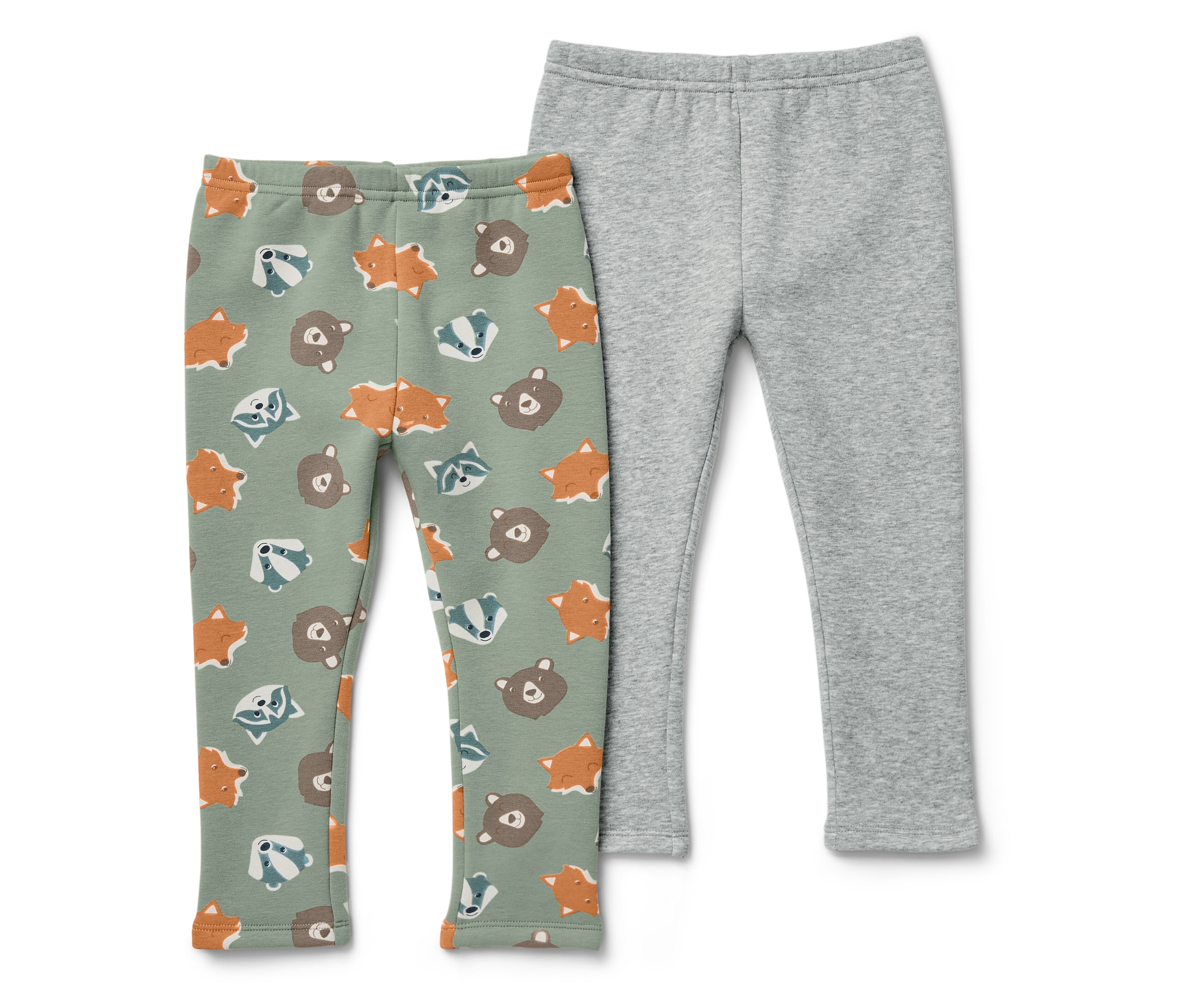 Zwei Kinderleggings. Eine Leggings ist grün mit Tiermuster, die andere ist grau.