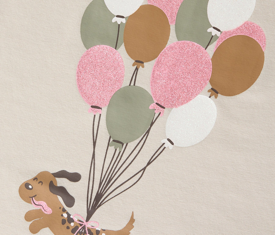 Grafik eines Cartoon-Hundes, der an einer Reihe von Ballons hängt.