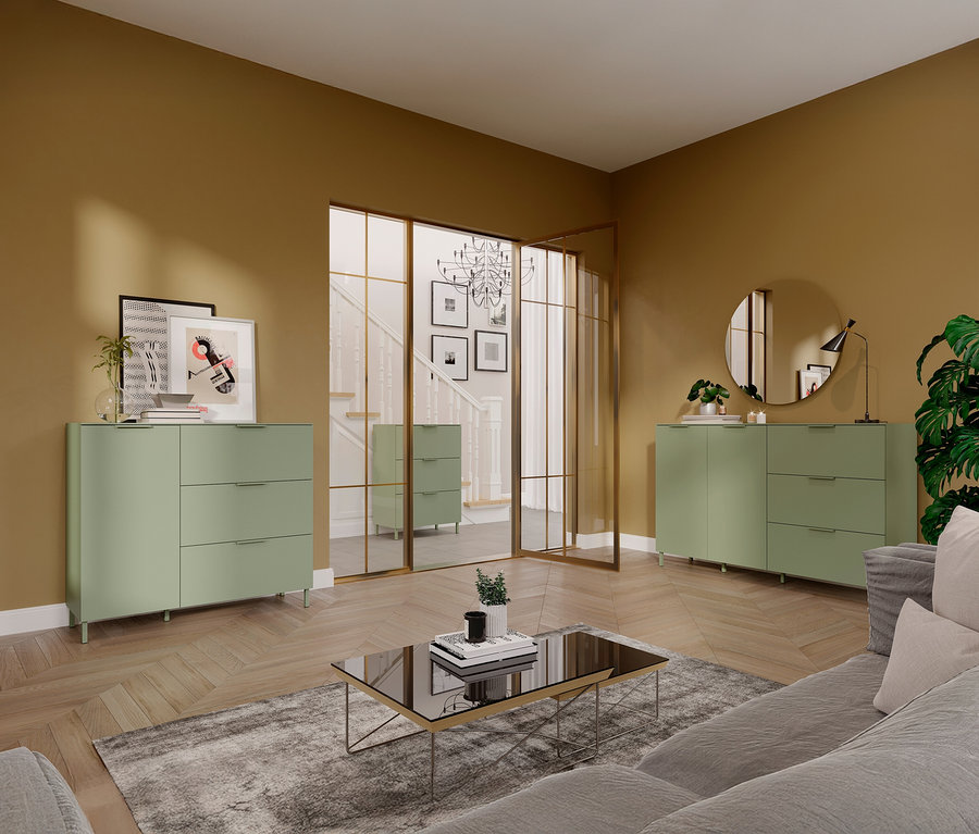 Wohnzimmer mit zwei taupegrünen Sideboards »Savoca« an gegenüberliegenden Wänden, getrennt durch eine Glastür.