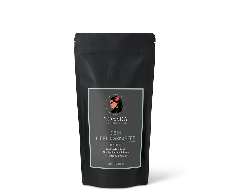 Eine schwarze Tüte YOANDA Lieblingskaffee Espresso mit der Aufschrift "Schokoladig, intensiv 90% Arabica | 10% Robusta".