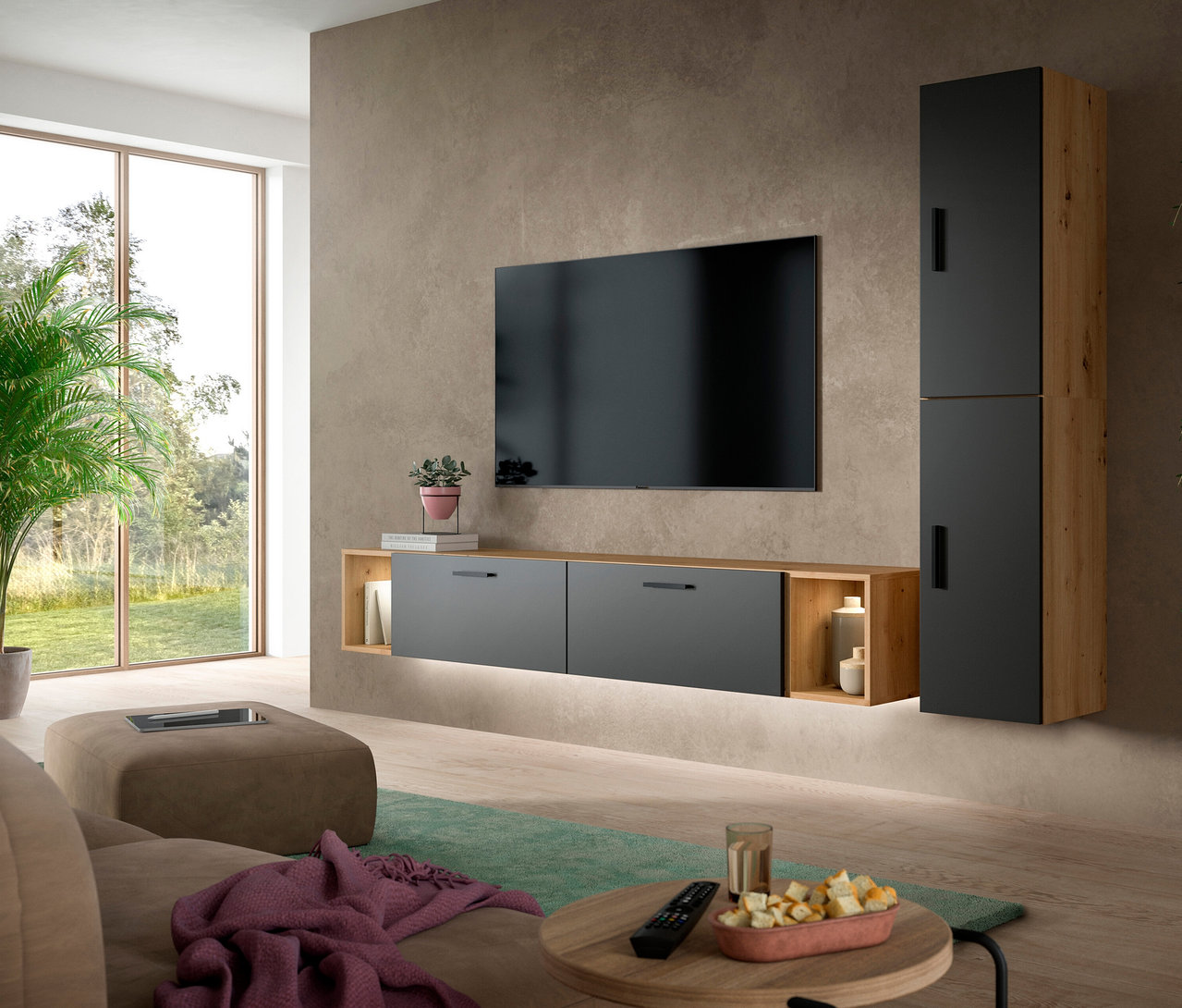 Modernes Wohnzimmer mit einer grauen xonox Wohnkombination »Only« und einem montierten Fernseher. Die Kombination umfasst ein schwebendes Lowboard mit Schubladen und beleuchteten offenen Fächern sowie einen hohen Schrank in Grau und Holzoptik. Links ein großes Fenster, rechts ein Sofa und ein Couchtisch.
