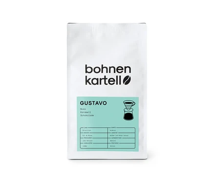 Eine Packung bohnenkartell - Gustavo Filterkaffee - 250 g Ganze Bohne mit Noten von Nuss, Karamell und Schokolade ist abgebildet.