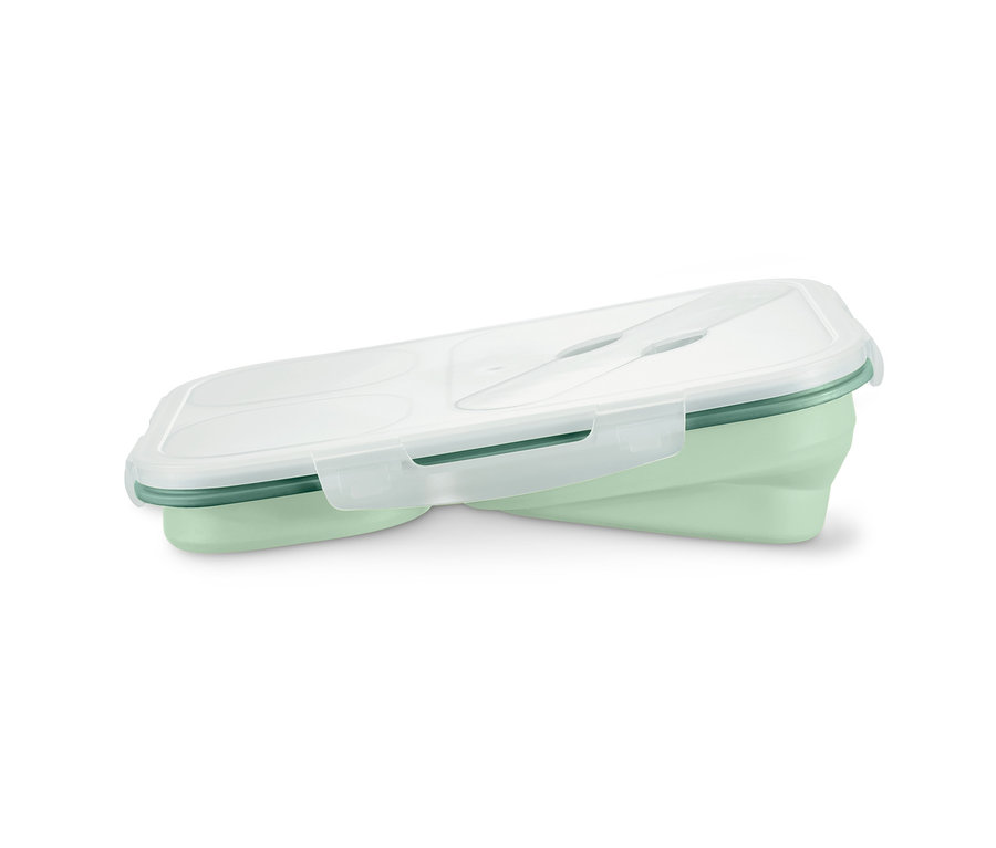 Eine grüne, faltbare Lunchbox.