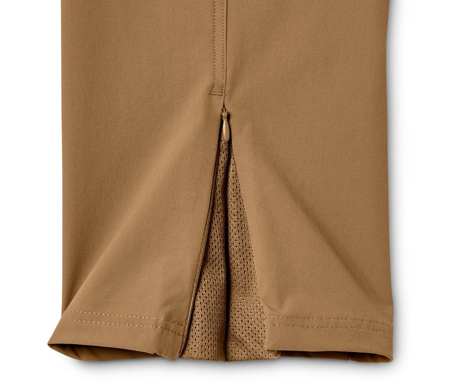 Detailaufnahme einer Outdoorhose in Braun mit geöffnetem Reißverschluss am Knöchel.