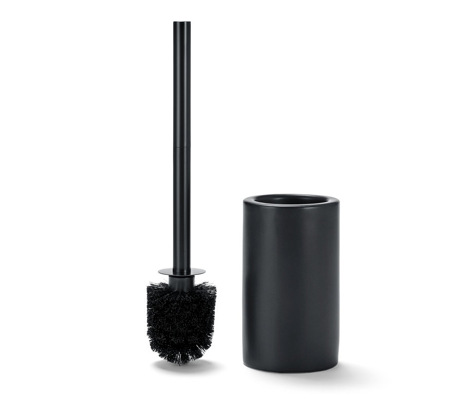 Schwarze WC-Bürste neben schwarzem Keramikhalter.