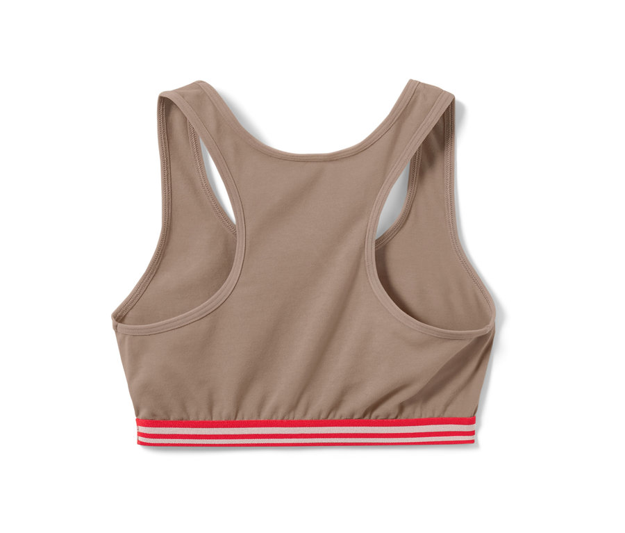 Ein einzelner, beiger Mädchen-Bustier mit rot-weiß gestreiftem Bund, aus einem 3er-Set.