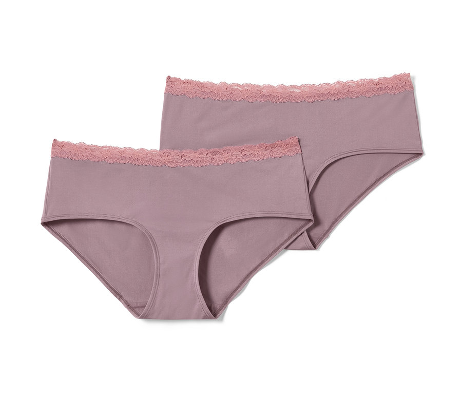 Zwei roséfarbene Pantys mit Spitze.