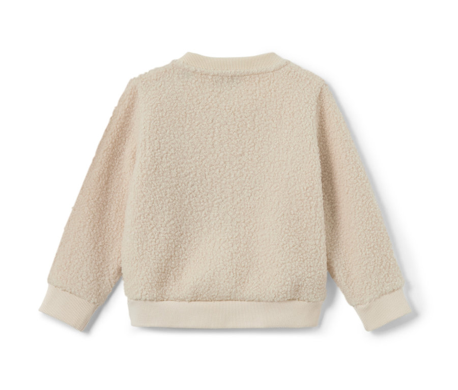 Detailansicht eines Kinder-Teddy-Sweaters.