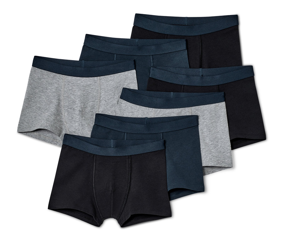 Ein 7er Pack Kinder-Slipboxer in Grau, Schwarz und Blau mit dunkelblauem Bund.