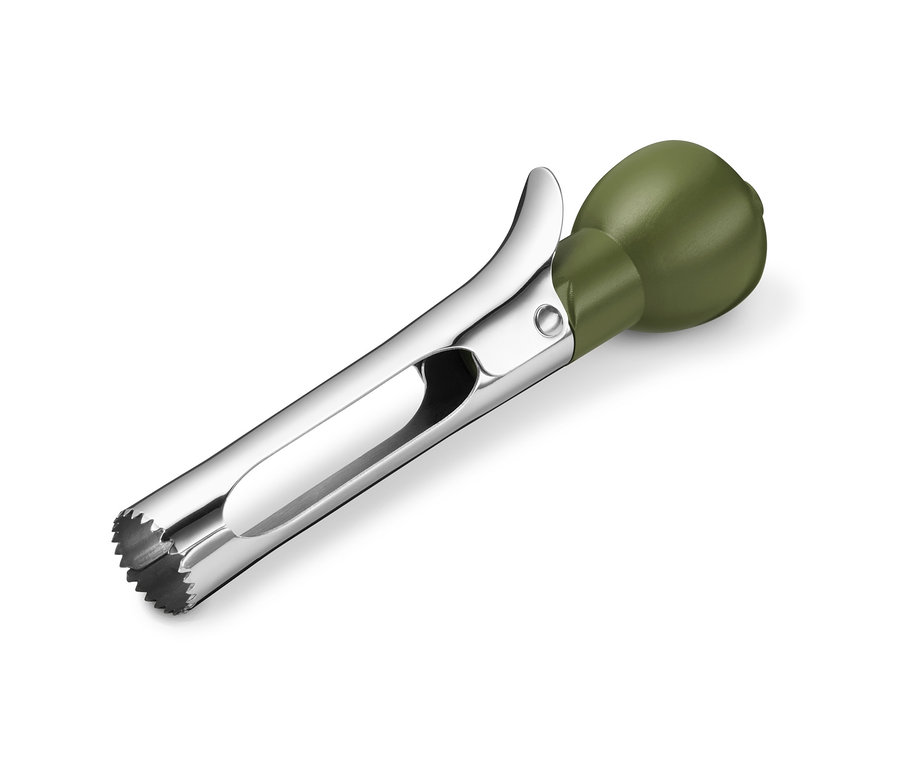 Apfelentkerner mit silbernem Griff und grünem Gummigriff.