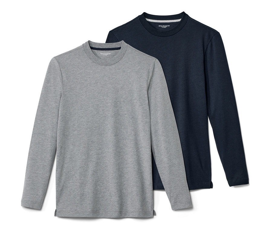 Zwei Langarm-Shirts, eines grau und eines dunkelblau, liegen nebeneinander.