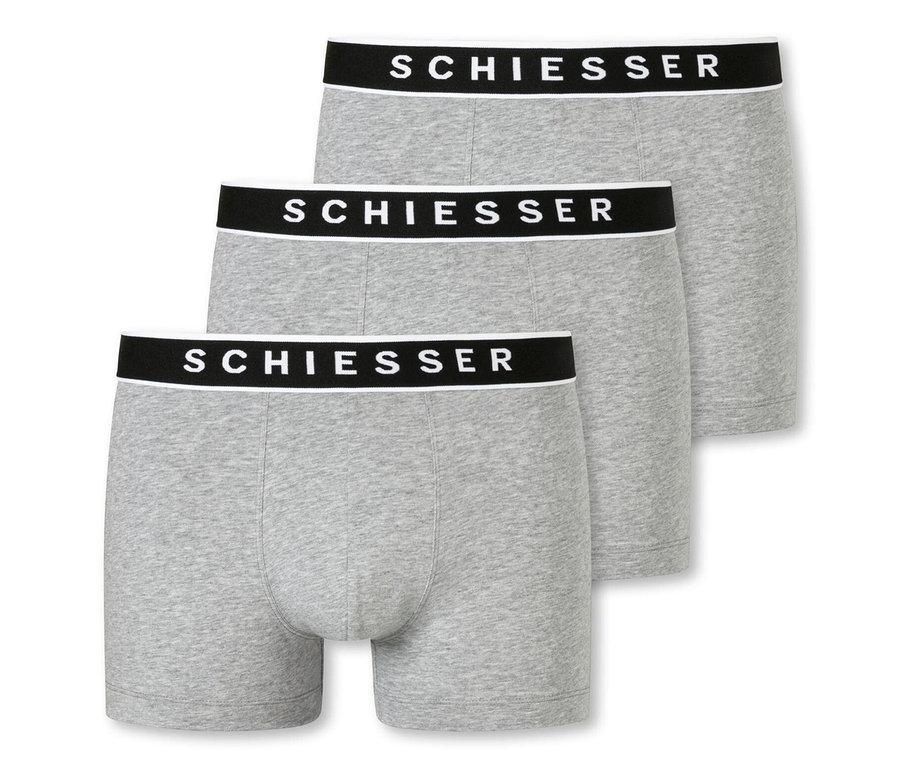 Drei grau melierte SCHIESSER Shorts mit Bio-Baumwolle in einer Reihe.