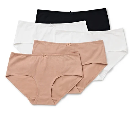 Ein Satz aus fünf Damenunterhosen in Schwarz, Weiß und Nude.