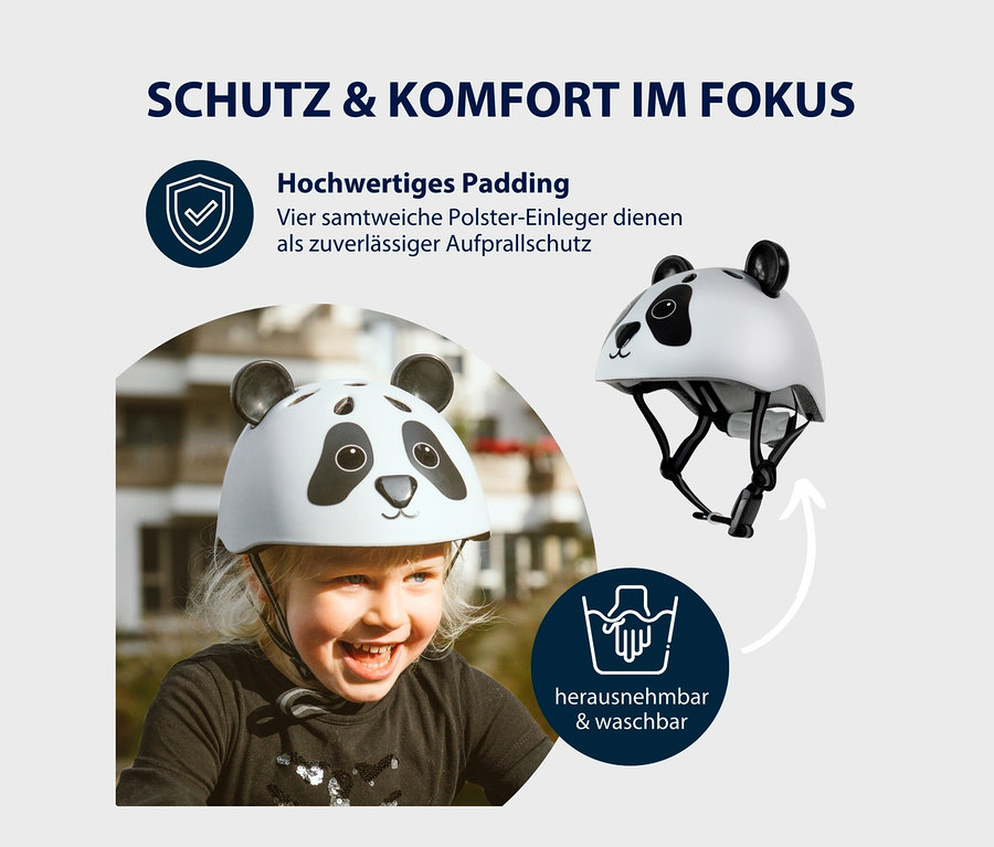 Lächelndes Mädchen trägt weißen HUDORA Kinderhelm »Pandy« mit Panda-Motiv, Größe 44–47.