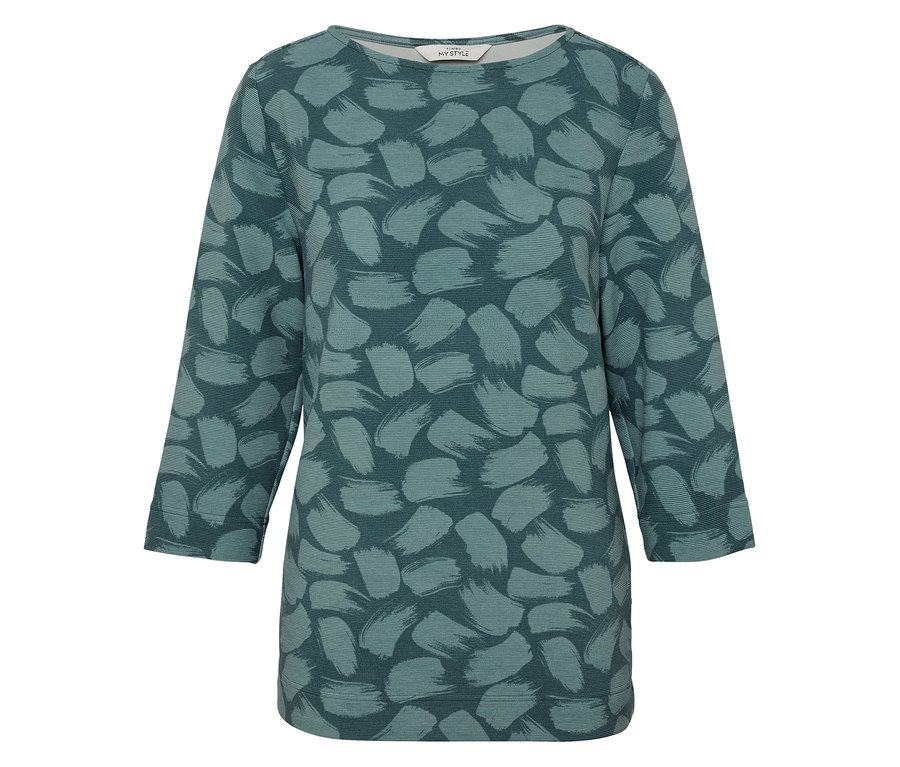 Ein Damenoberteil mit Dreiviertelärmeln und grünem Muster.