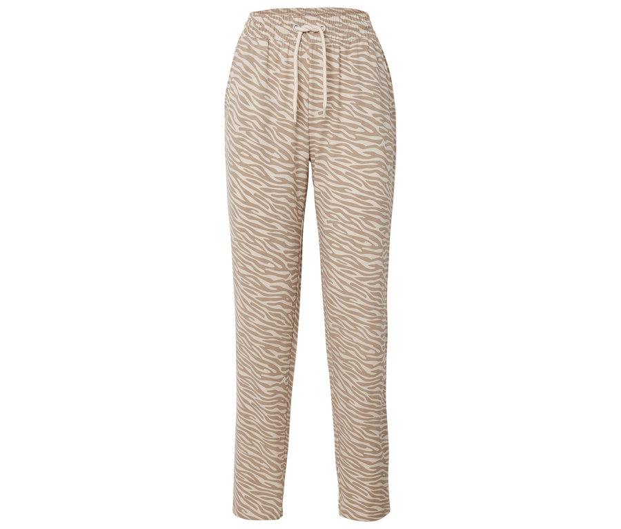 Ein Paar beige Hosen mit Animal-Print und Kordelzug.