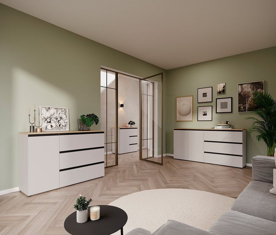 Wohnzimmer mit Kommode »Cormano«, groß, in Weiß mit drei Schubladen und Holzplatte. Eine weitere Kommode steht im Hintergrund.