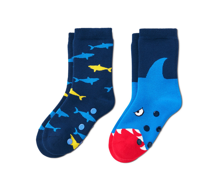 Zwei Paar Antirutsch-Socken mit Hai-Motiv.