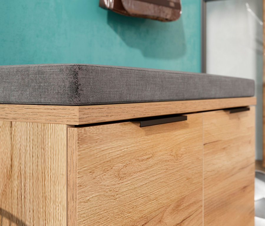 Detailaufnahme der Germania Schuhbank »GW-FREMONT« mit grauem Kissen und Fußball.