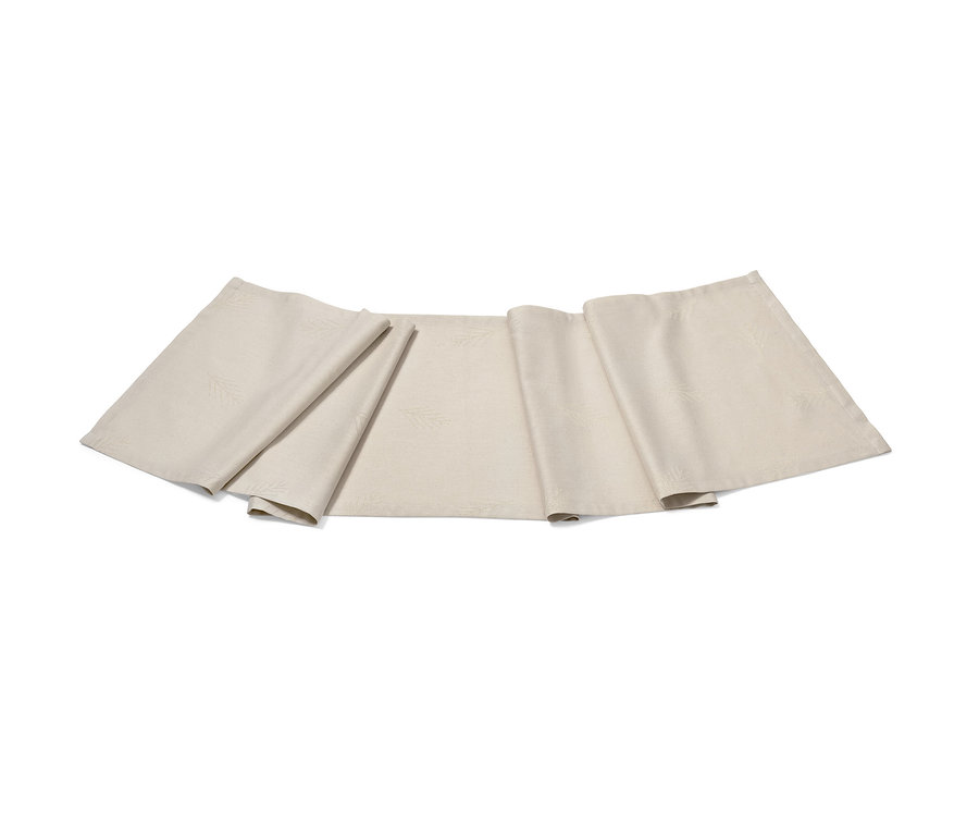 Ein offwhite Jacquard-Tischläufer liegt auf einem weißen Hintergrund.