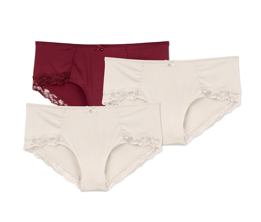 Drei Pantys mit Spitze: zwei cremefarbene und eine bordeauxfarbene.