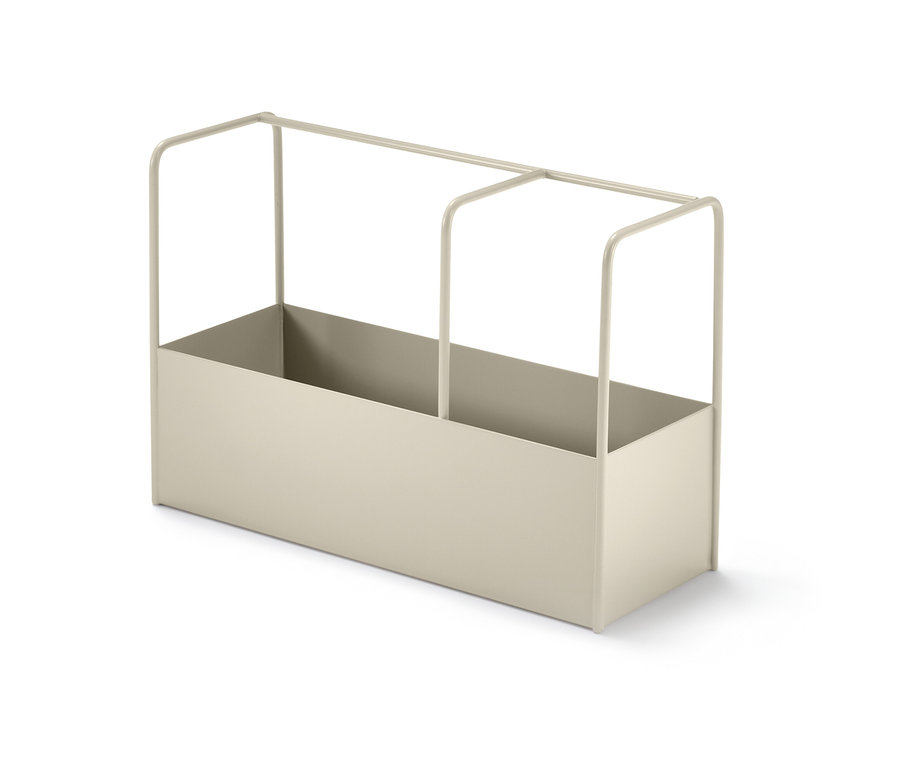 Ein beiger Utensilienständer.