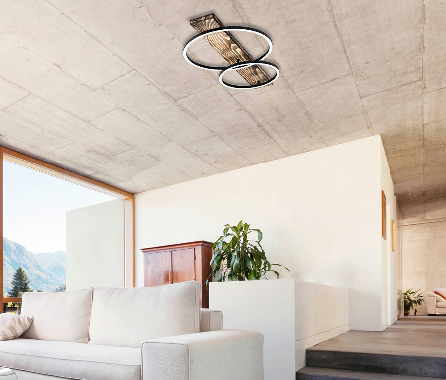 Wohnzimmer mit Sofa und Eglo 2er-LED-Deckenleuchte »Boyal«.