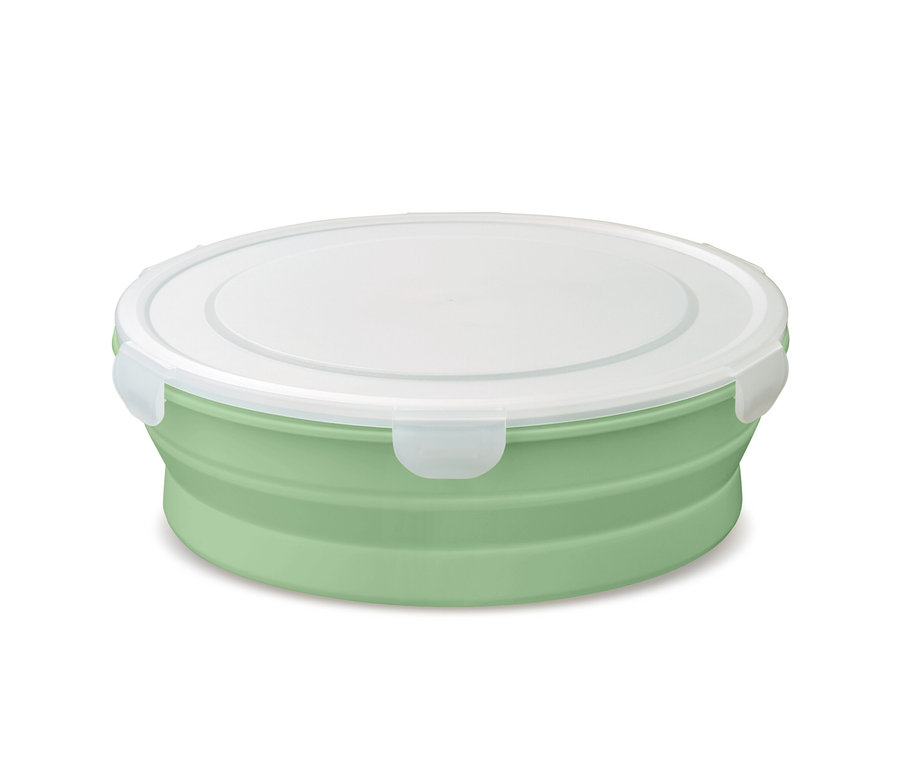 Eine grüne faltbare Salatschüssel mit einem weißen Deckel.