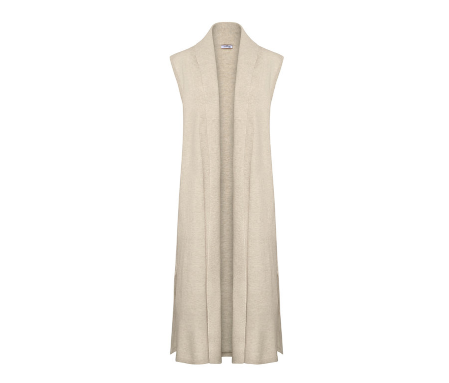 Eine lange, beige Lounge-Weste aus Strick.