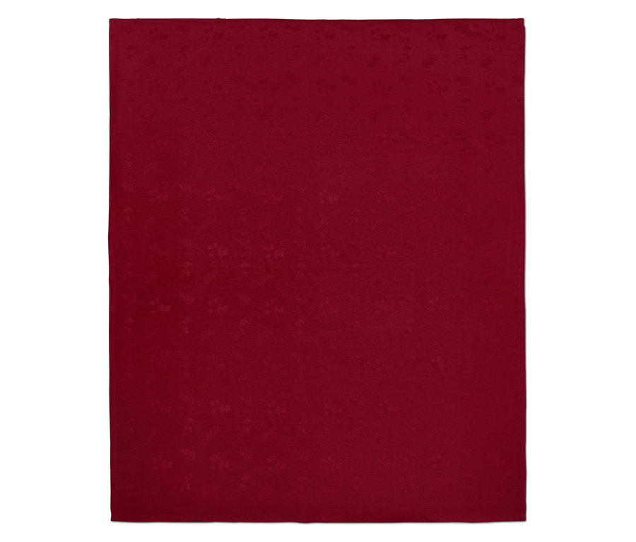 Eine rote Jacquard-Tischdecke.