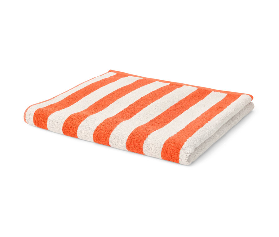 Ein gefaltetes XL-Badetuch mit orangefarbenen und weißen Streifen.