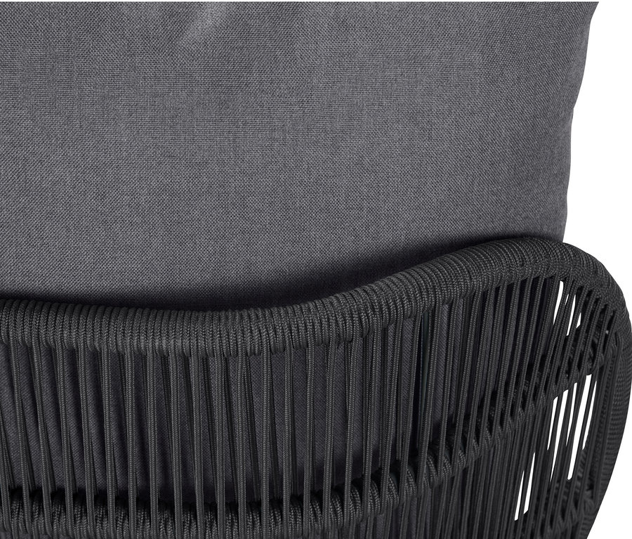 Detailansicht eines grauen Daybeds mit Kopfteil mit Textilgeflecht.