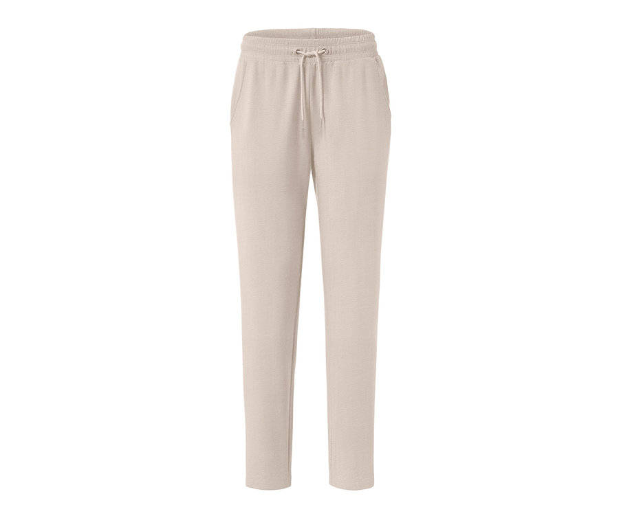 Beige Sweathose mit Kordelzug in der Taille.