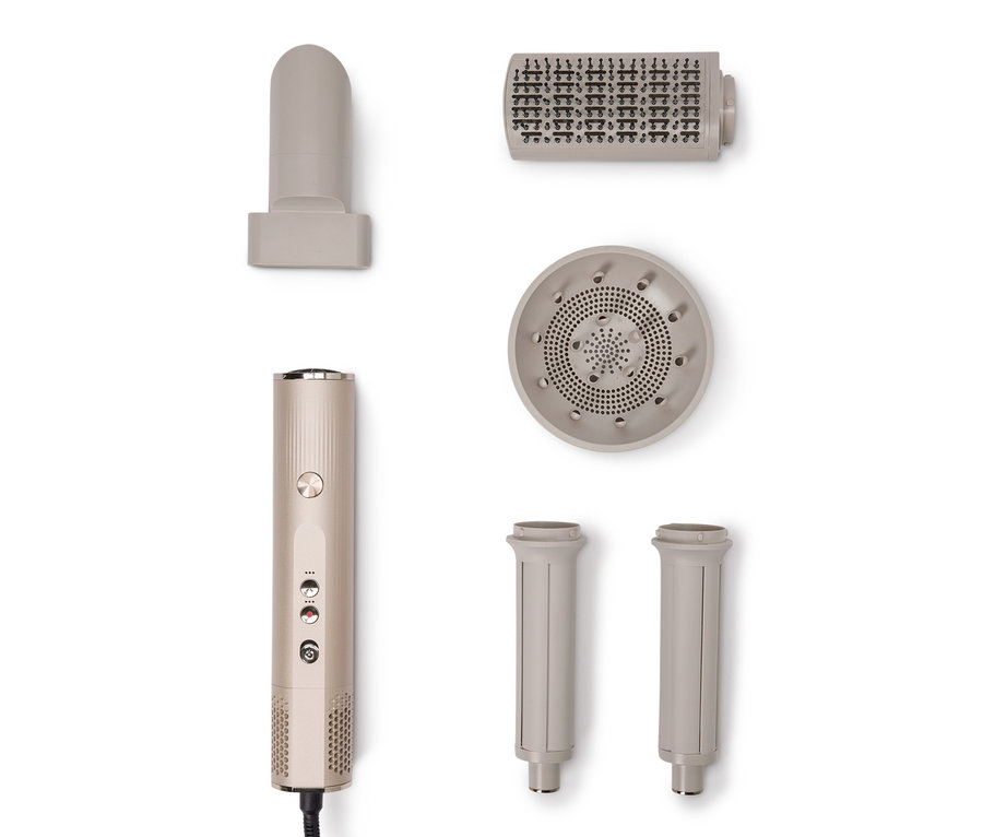 Ein zerlegtes 5-in-1-Multi-Haarstyler-Set und seine Aufsätze auf einem weißen Hintergrund.
