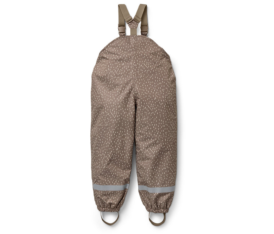 Braune Latzhose mit weißen Punkten.