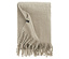 Beige Decke mit Fransen und Etikett.