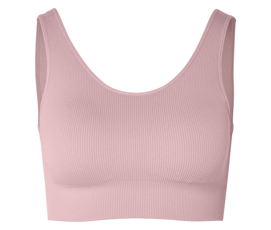 Nahaufnahme eines gerippten, rosa Sport-BHs mit V-Ausschnitt vor einem weißen Hintergrund.
