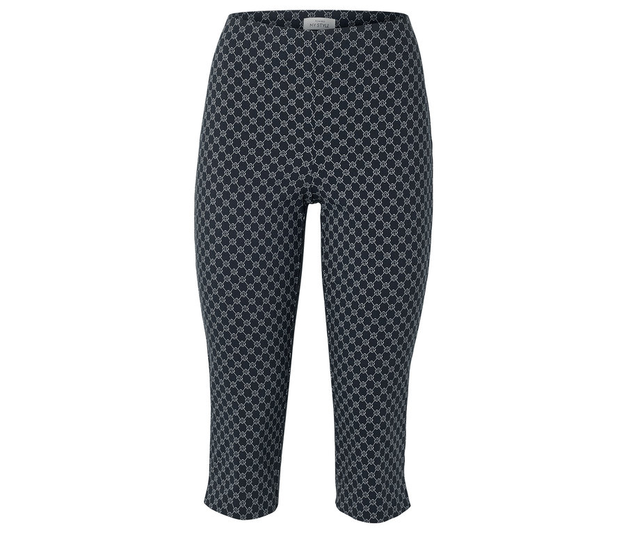 Eine marineblaue Caprihose mit einem sich wiederholenden weißen geometrischen Muster.