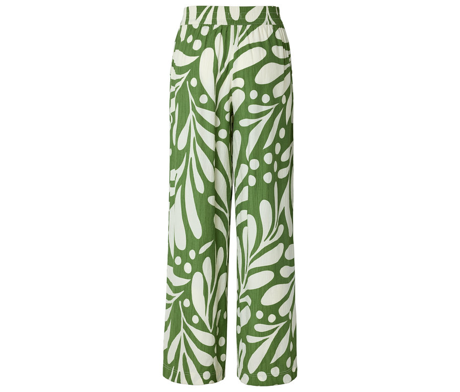 Grüne Hose mit weißem Blattmuster.