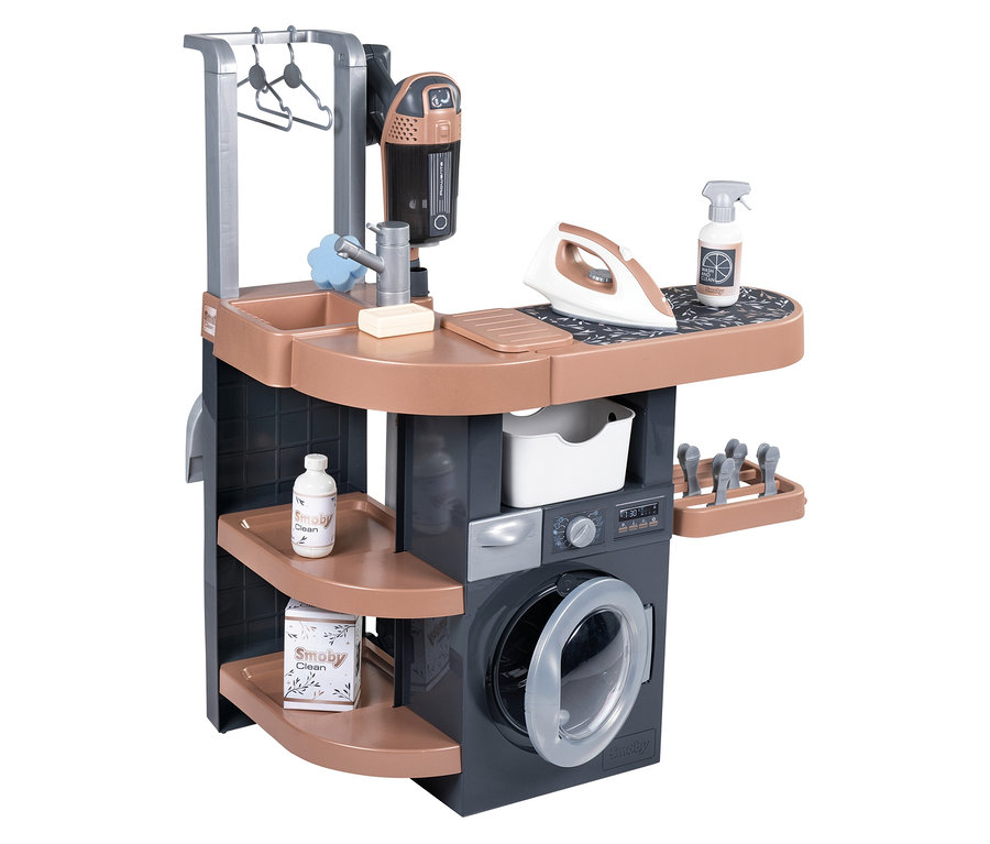 Spielzeug-Waschküche mit Waschmaschine, Bügeleisen und Zubehör.