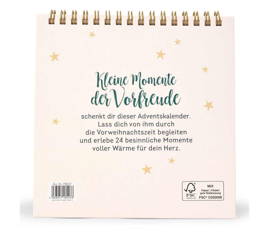 Weißer Kalender mit der Aufschrift "Kleine Momente der Vorfreude" und goldenen Sternen.