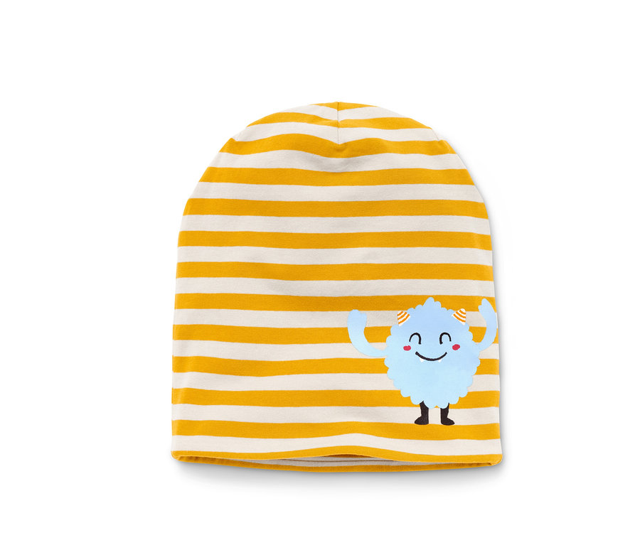 Gelb-weiss gestreifte Mütze mit einem blauen Cartoon-Monster.
